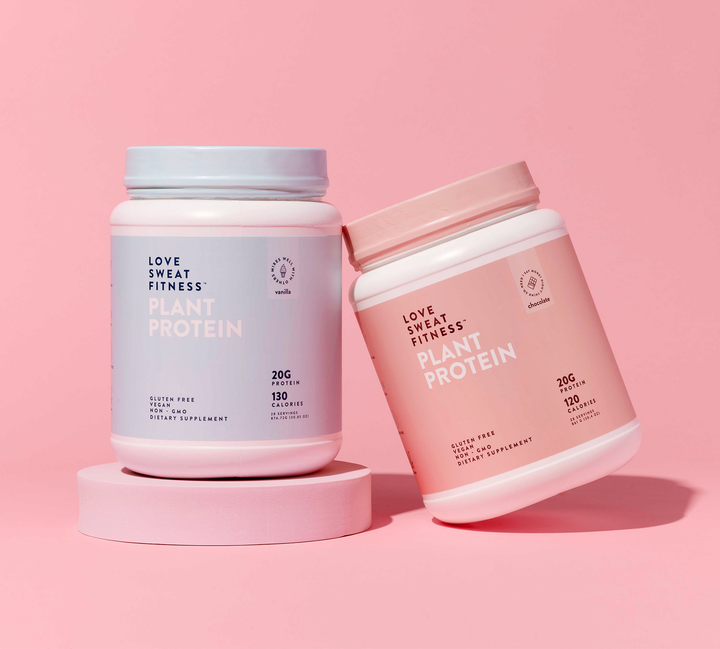 Two containers of plant protein powder, one labeled as vanilla and one as chocolate, presented on a pink background.