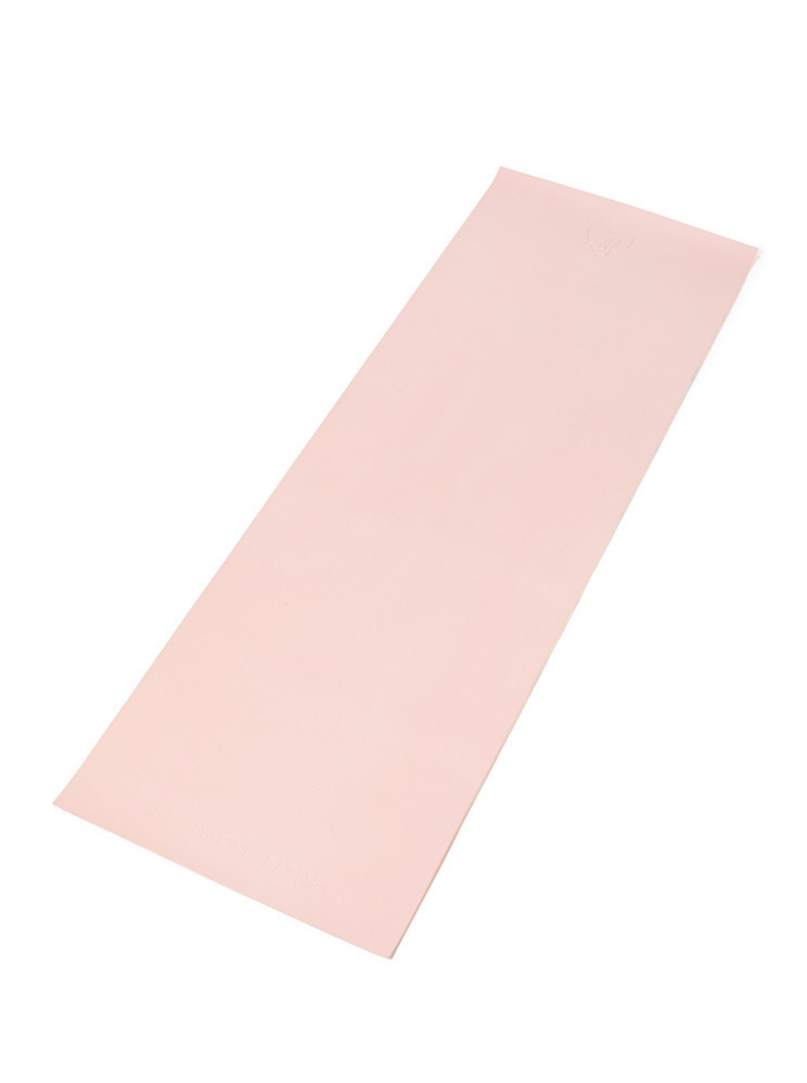 Pink yoga mat laid out