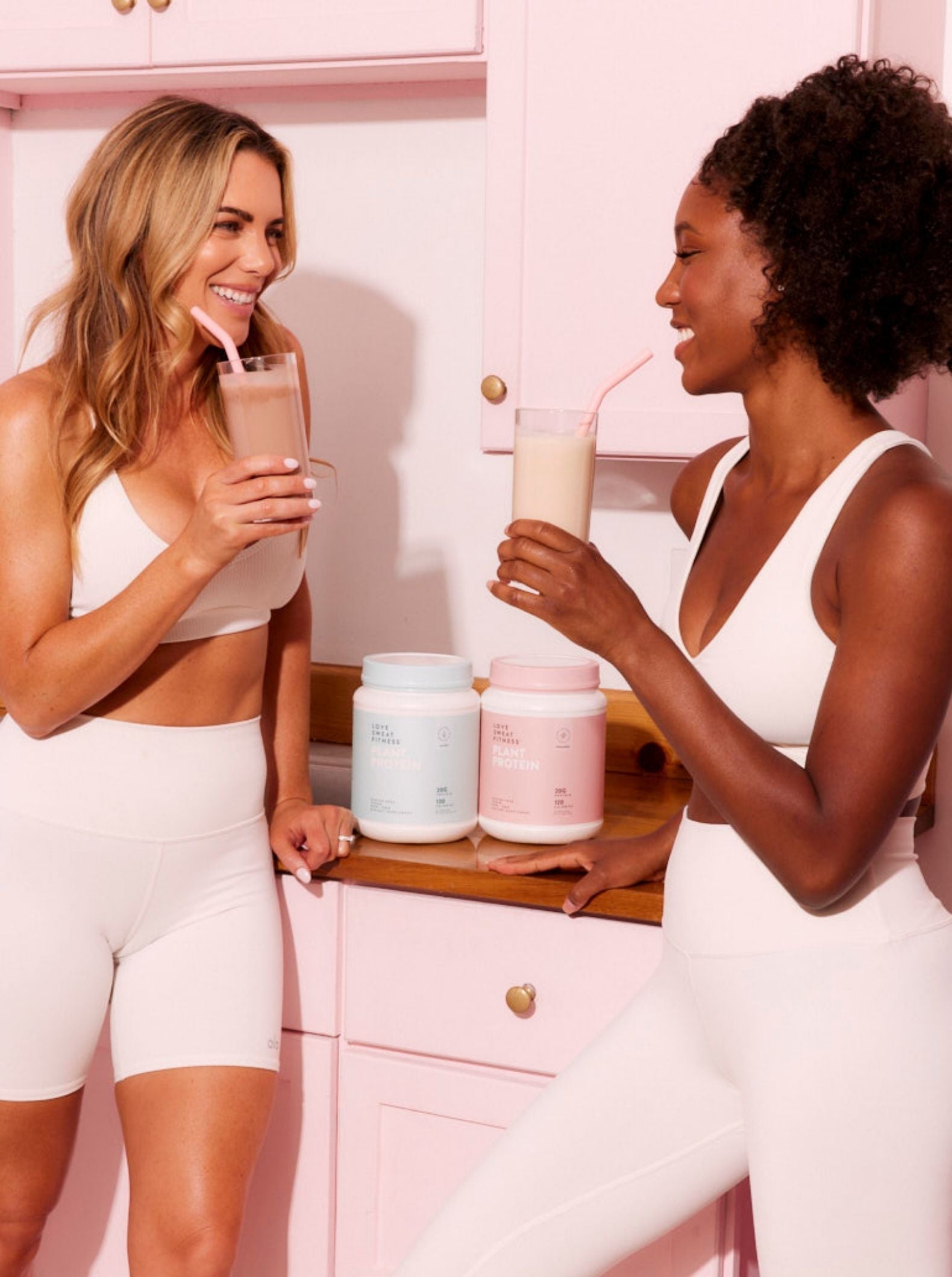Girls drinking protein smoothies