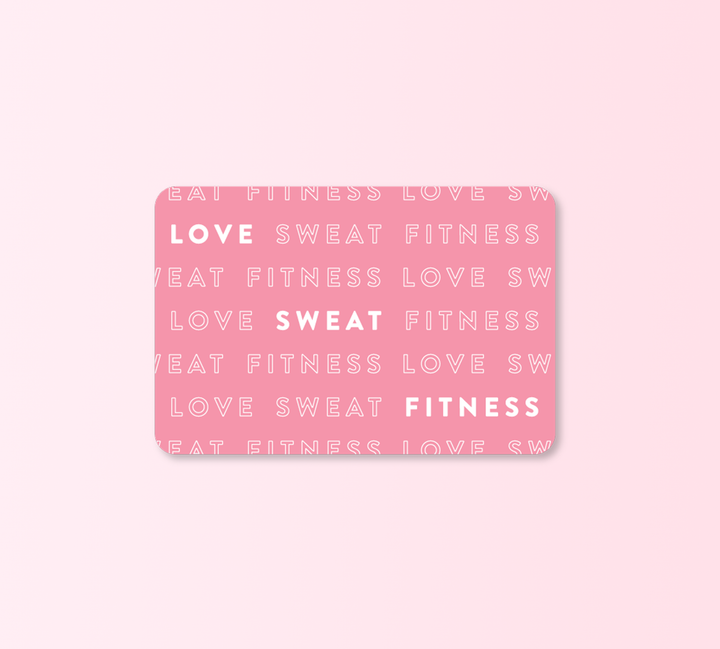 A pink gift card with the text 'LOVE SWEAT FITNESS' written in white, indicating a theme of love and fitness.