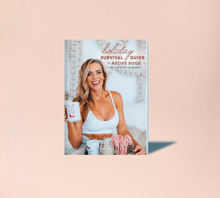 Cover of the 'Holiday Survival Guide & Recipe Book' featuring a smiling woman holding a mug