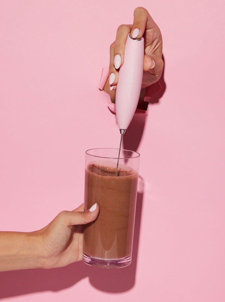 Whisk mixing protein powder in water